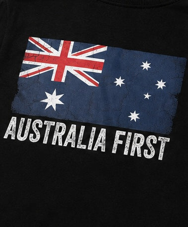 Close-up of the distressed Australian flag and AUSTRALIA FIRST lettering in white on the back of The Australian Lobby Group black short-sleeve t-shirt.